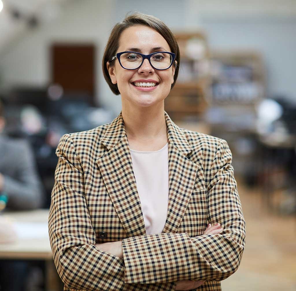 successful businesswoman posing in office 7Y384B5